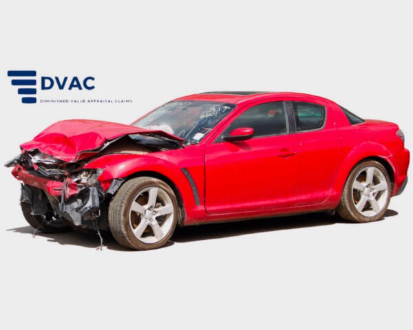 a red sports car with a crashed in front end and hood